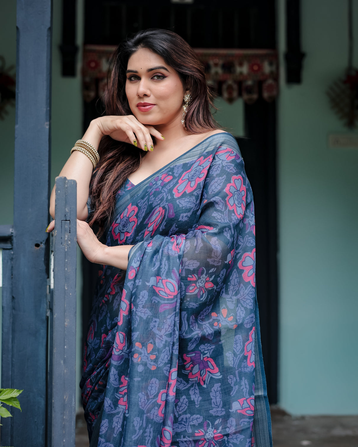 Navy blue pure cotton linen saree with floral print blouse and tassel detailing