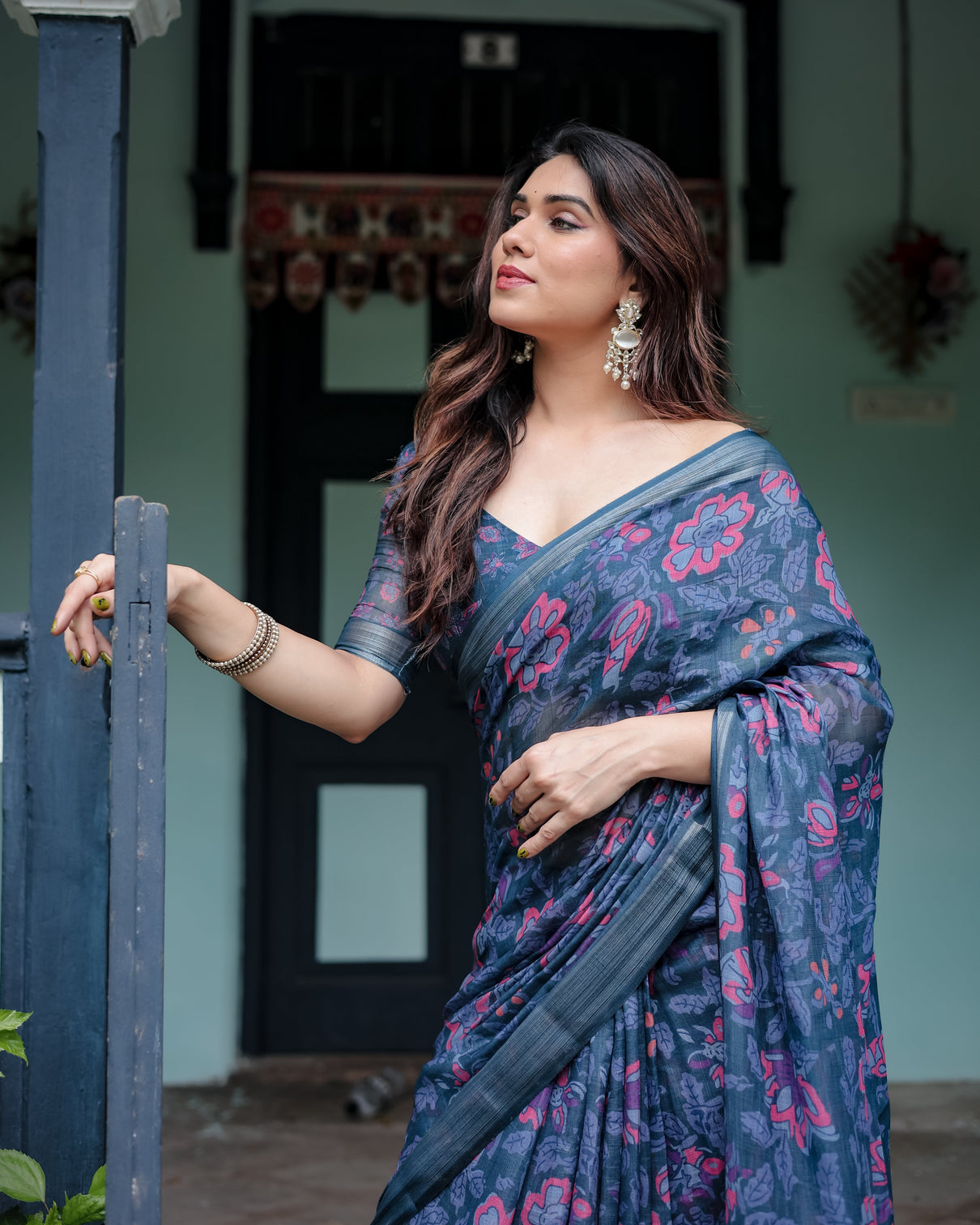 Navy blue pure cotton linen saree with floral print blouse and tassel detailing