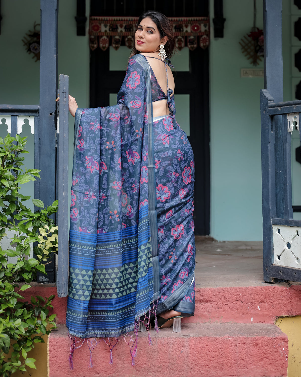 Navy blue pure cotton linen saree with floral print blouse and tassel detailing
