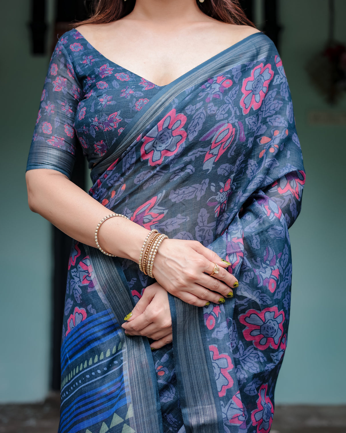 Navy blue pure cotton linen saree with floral print blouse and tassel detailing