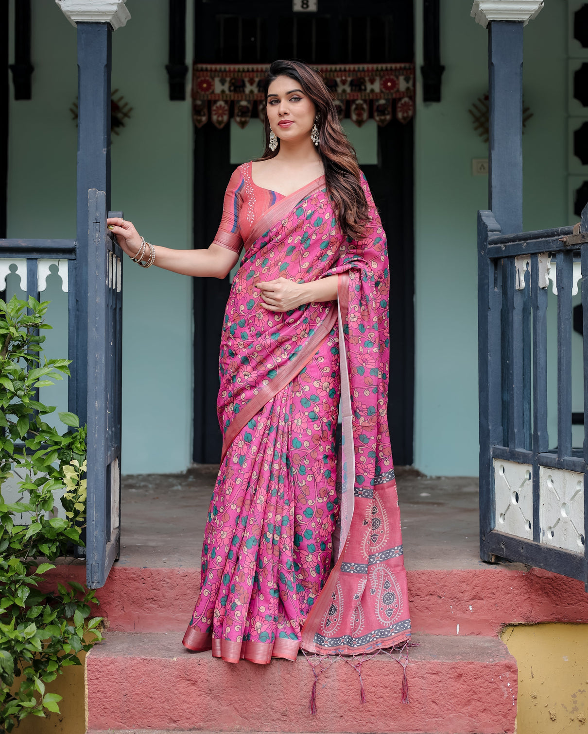 Magenta and pink pure cotton linen saree with floral and paisley block print blouse and tassel detailing