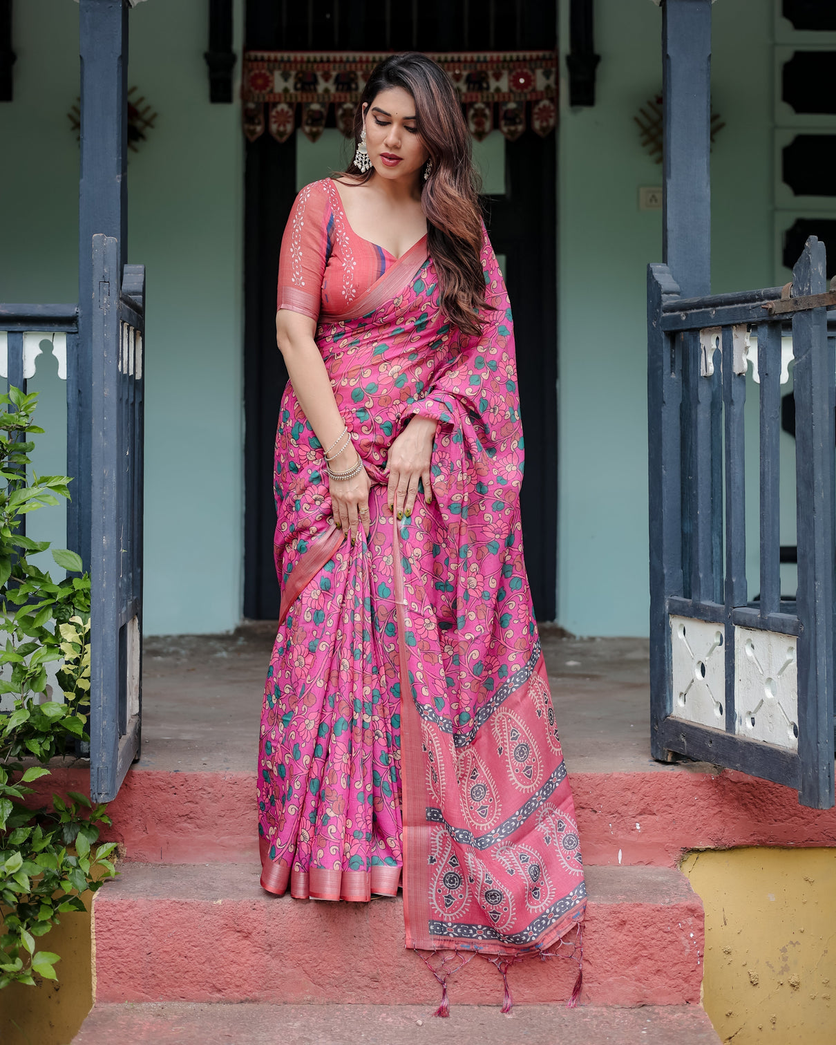 Magenta and pink pure cotton linen saree with floral and paisley block print blouse and tassel detailing