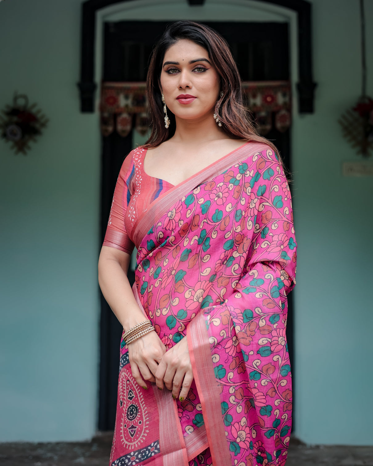Magenta and pink pure cotton linen saree with floral and paisley block print blouse and tassel detailing