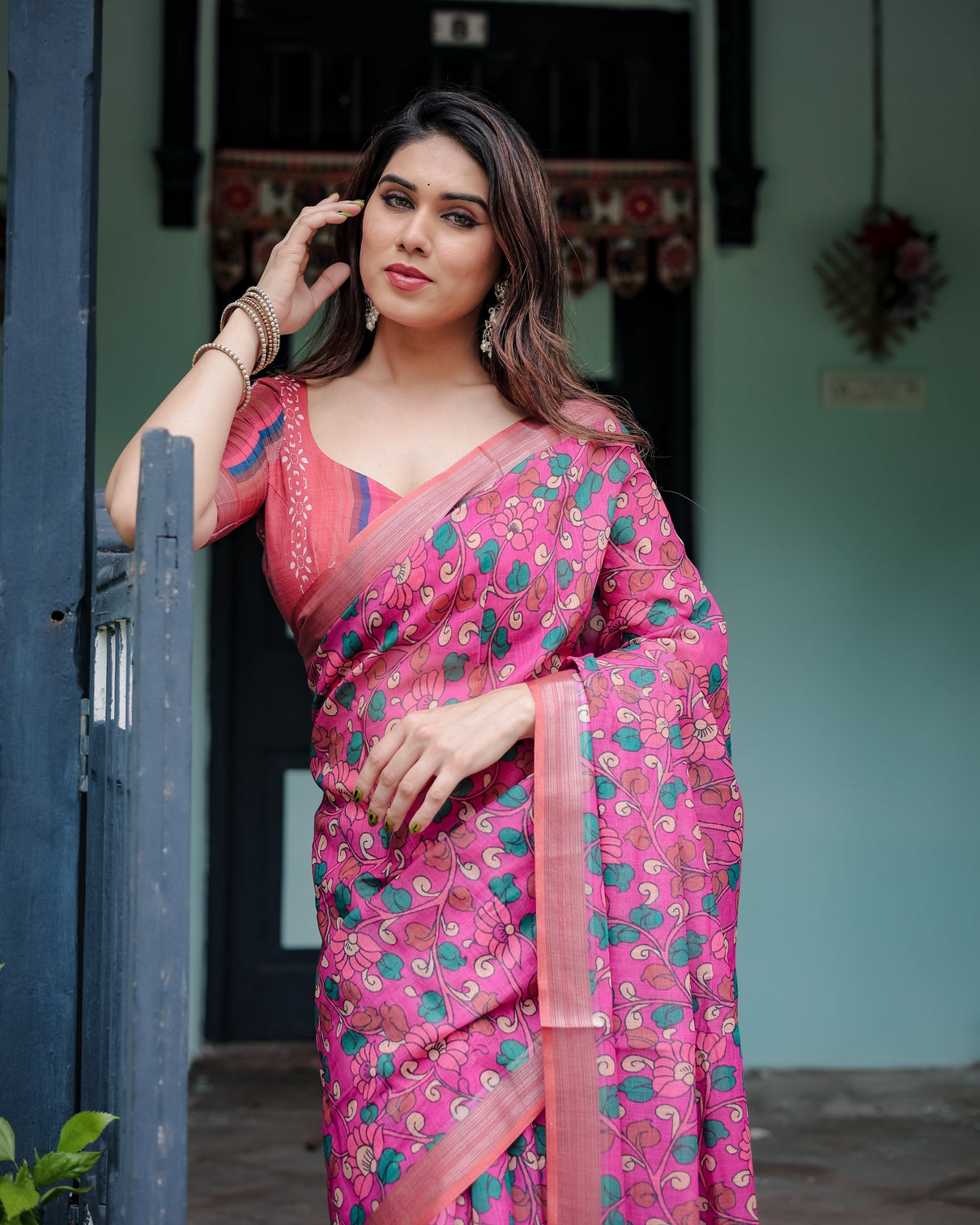 Magenta and pink pure cotton linen saree with floral and paisley block print blouse and tassel detailing