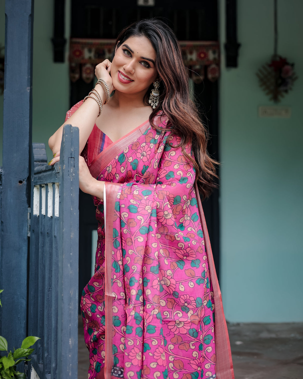 Magenta and pink pure cotton linen saree with floral and paisley block print blouse and tassel detailing
