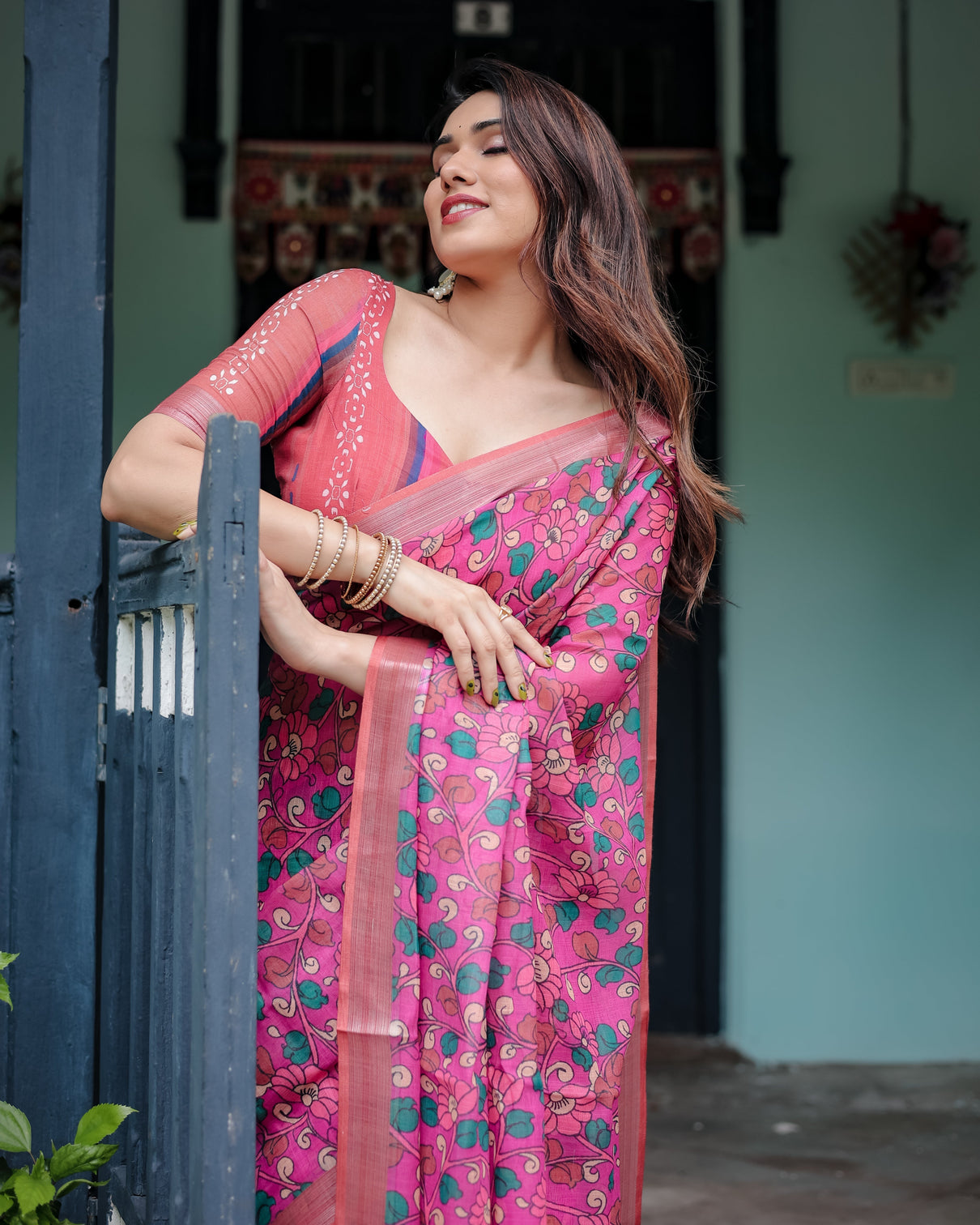Magenta and pink pure cotton linen saree with floral and paisley block print blouse and tassel detailing