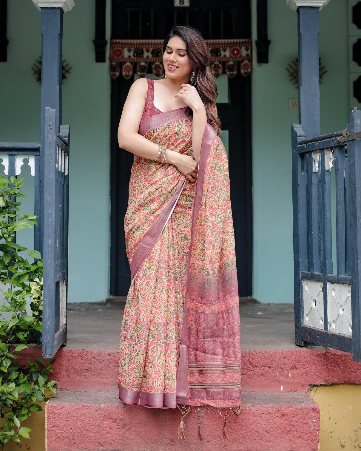 Beige and rust pure cotton linen saree with tribal block print blouse and tassel detailing