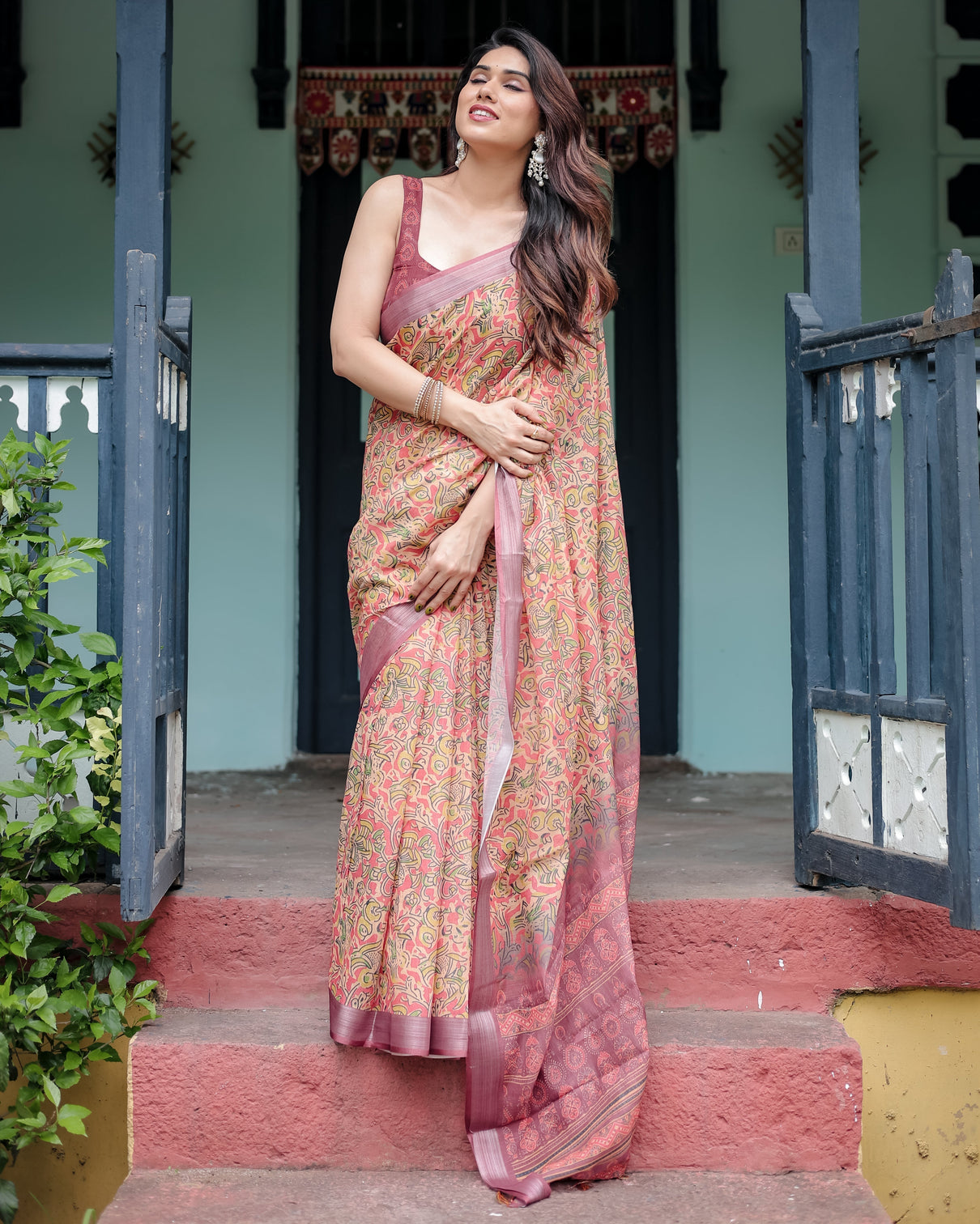Beige and rust pure cotton linen saree with tribal block print blouse and tassel detailing