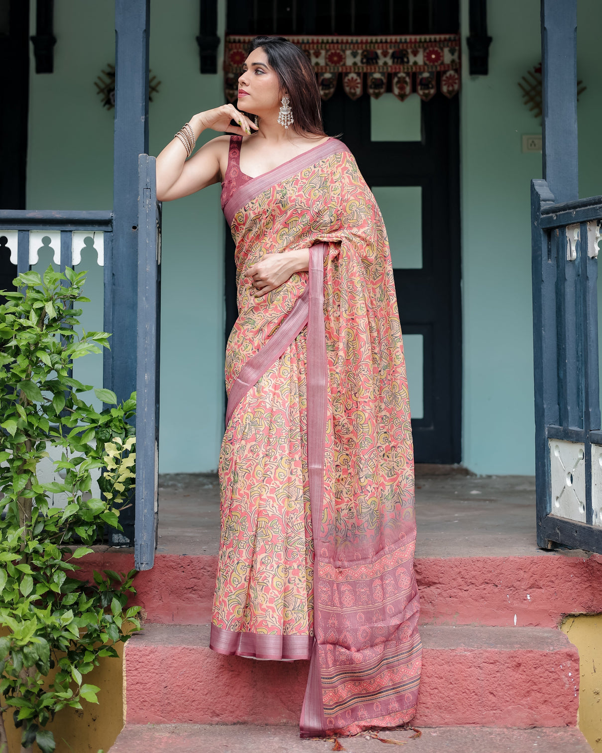Beige and rust pure cotton linen saree with tribal block print blouse and tassel detailing