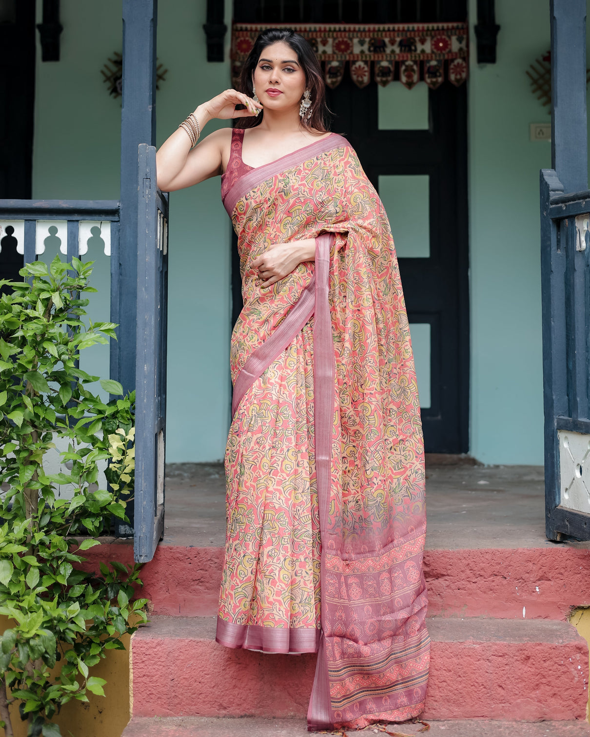 Beige and rust pure cotton linen saree with tribal block print blouse and tassel detailing