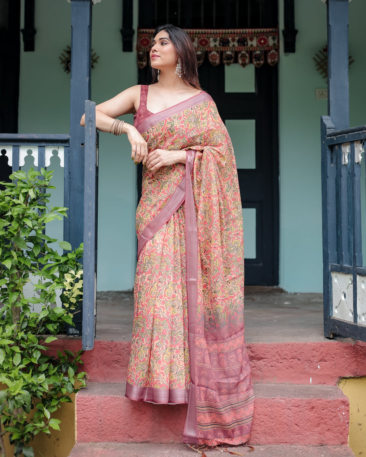 Beige and rust pure cotton linen saree with tribal block print blouse and tassel detailing