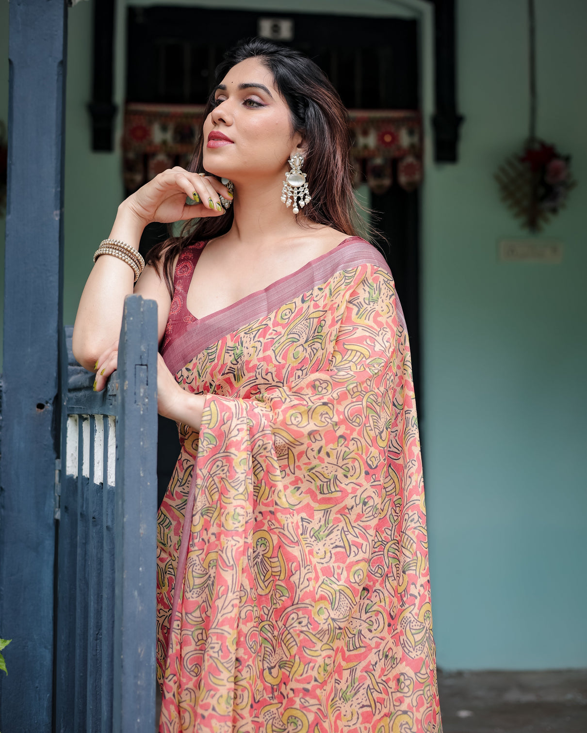 Beige and rust pure cotton linen saree with tribal block print blouse and tassel detailing