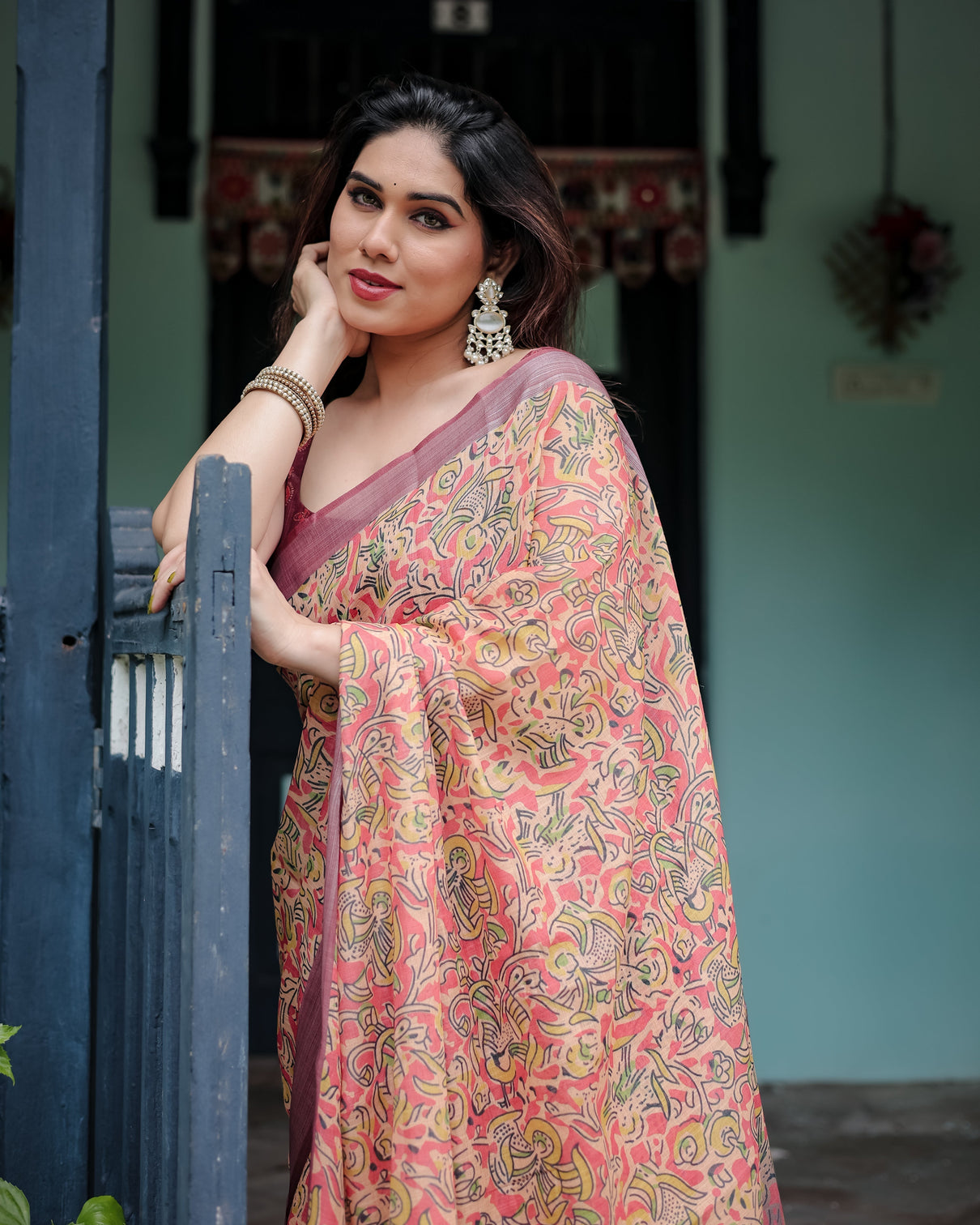 Beige and rust pure cotton linen saree with tribal block print blouse and tassel detailing