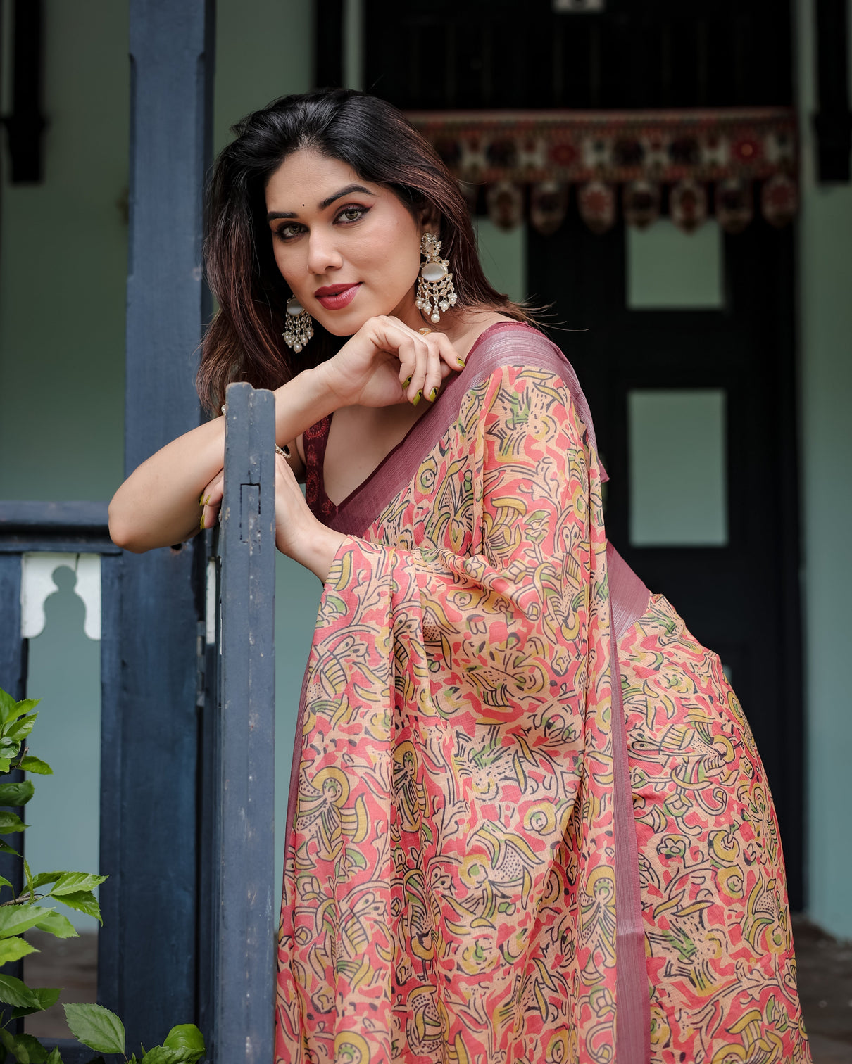 Beige and rust pure cotton linen saree with tribal block print blouse and tassel detailing