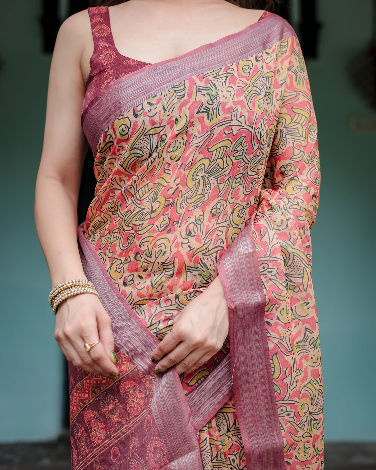 Beige and rust pure cotton linen saree with tribal block print blouse and tassel detailing