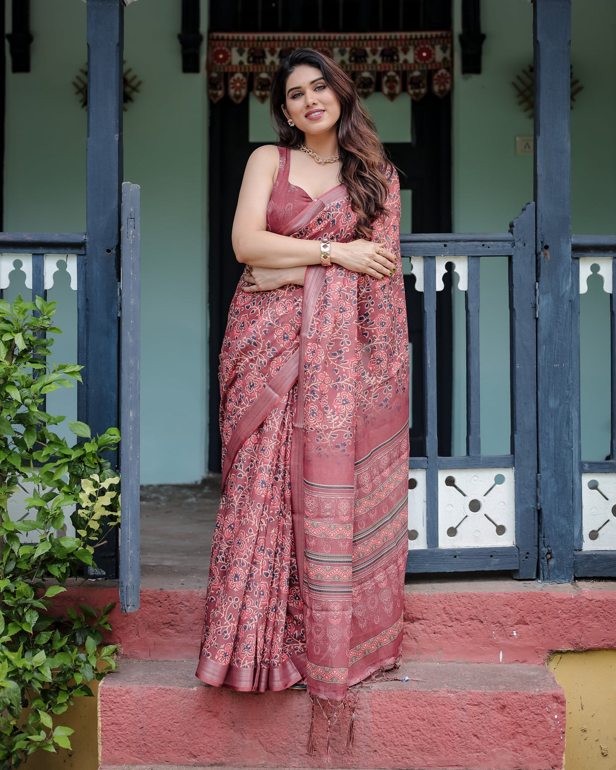 Rust red pure cotton linen saree with floral block print blouse and tassel detailing mameraa