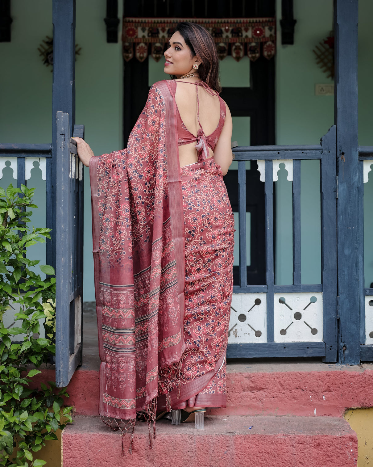 Rust red pure cotton linen saree with floral block print blouse and tassel detailing