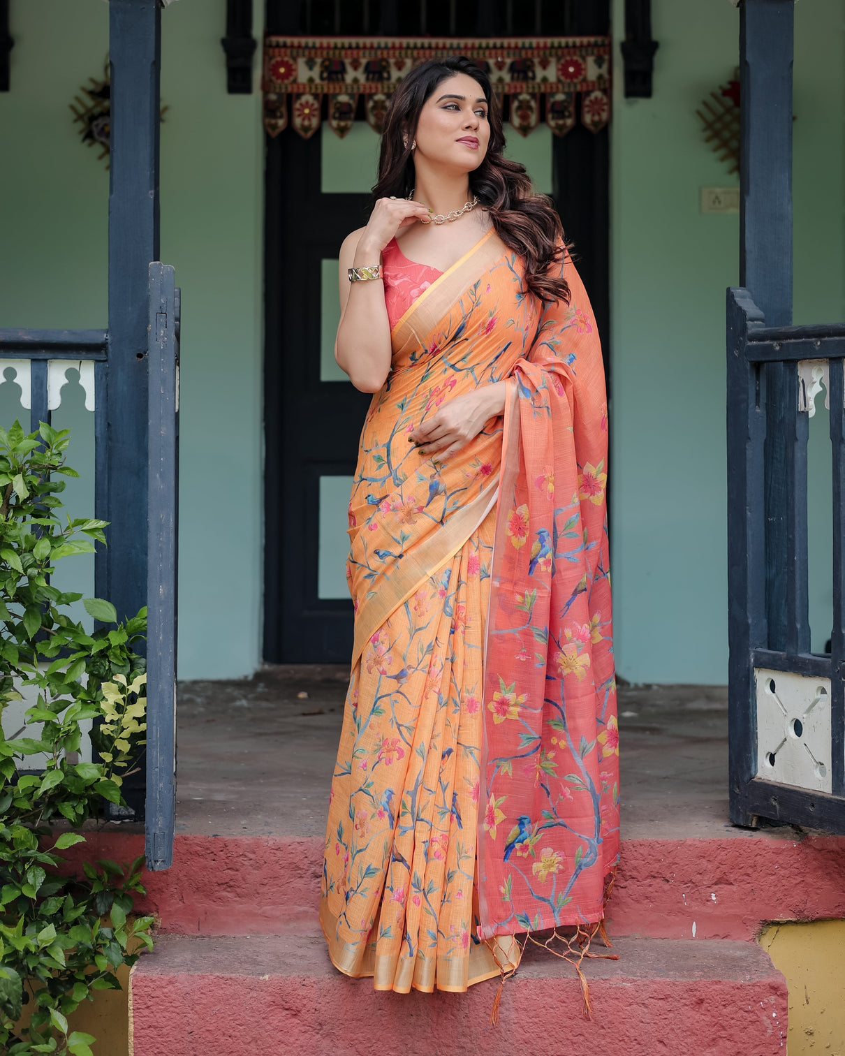 Peach and orange pure cotton linen saree with floral and bird print blouse and tassel detailing mameraa
