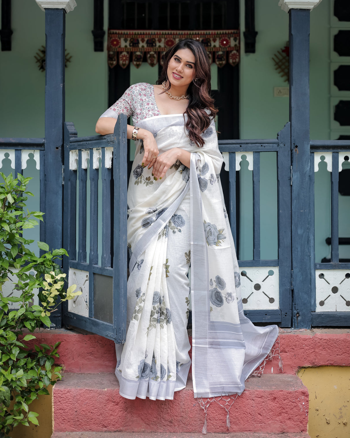 White and grey pure cotton linen saree with floral print blouse and tassel detailing