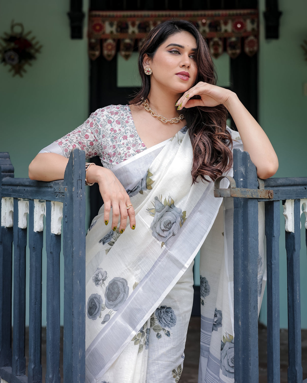 White and grey pure cotton linen saree with floral print blouse and tassel detailing