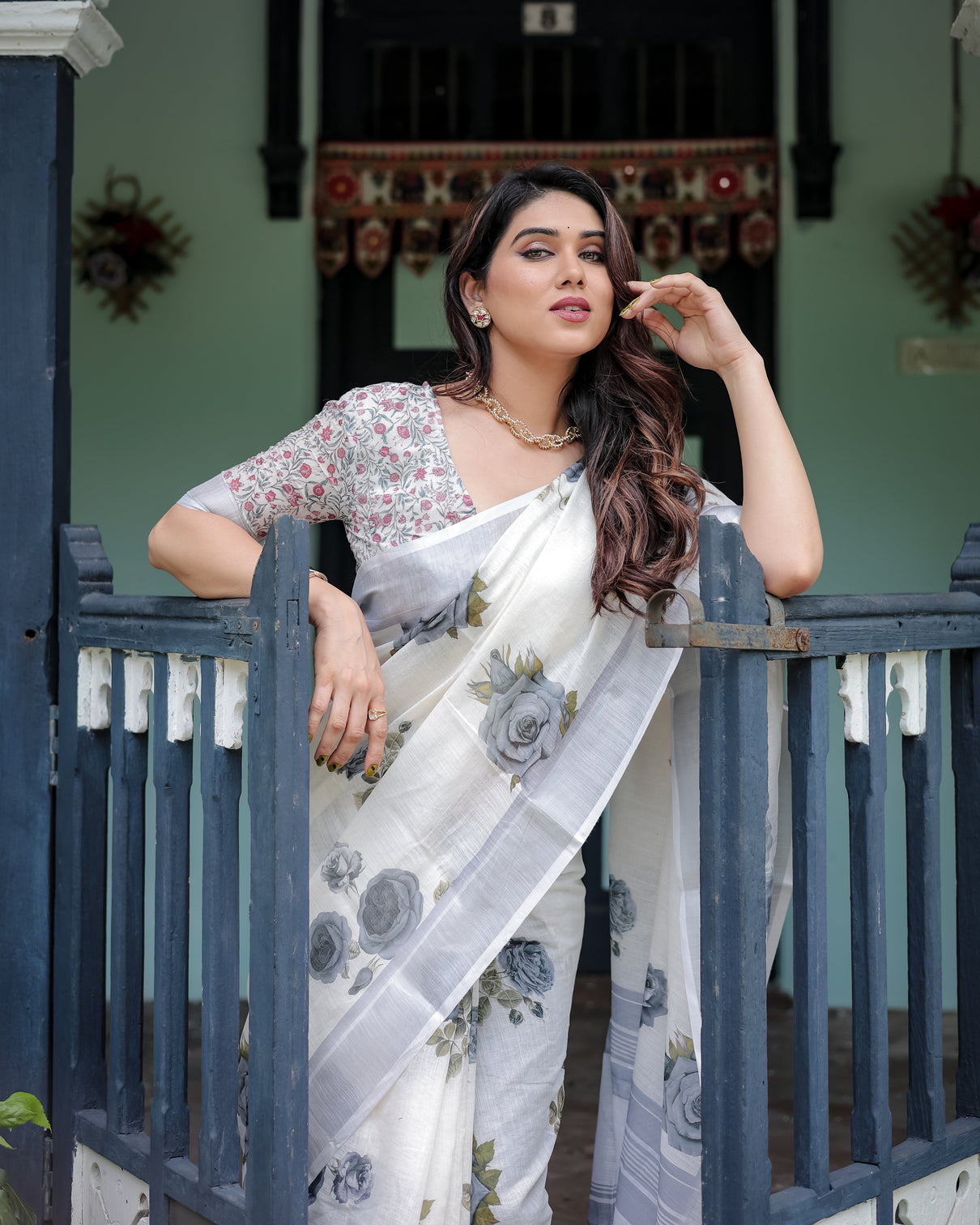 White and grey pure cotton linen saree with floral print blouse and tassel detailing