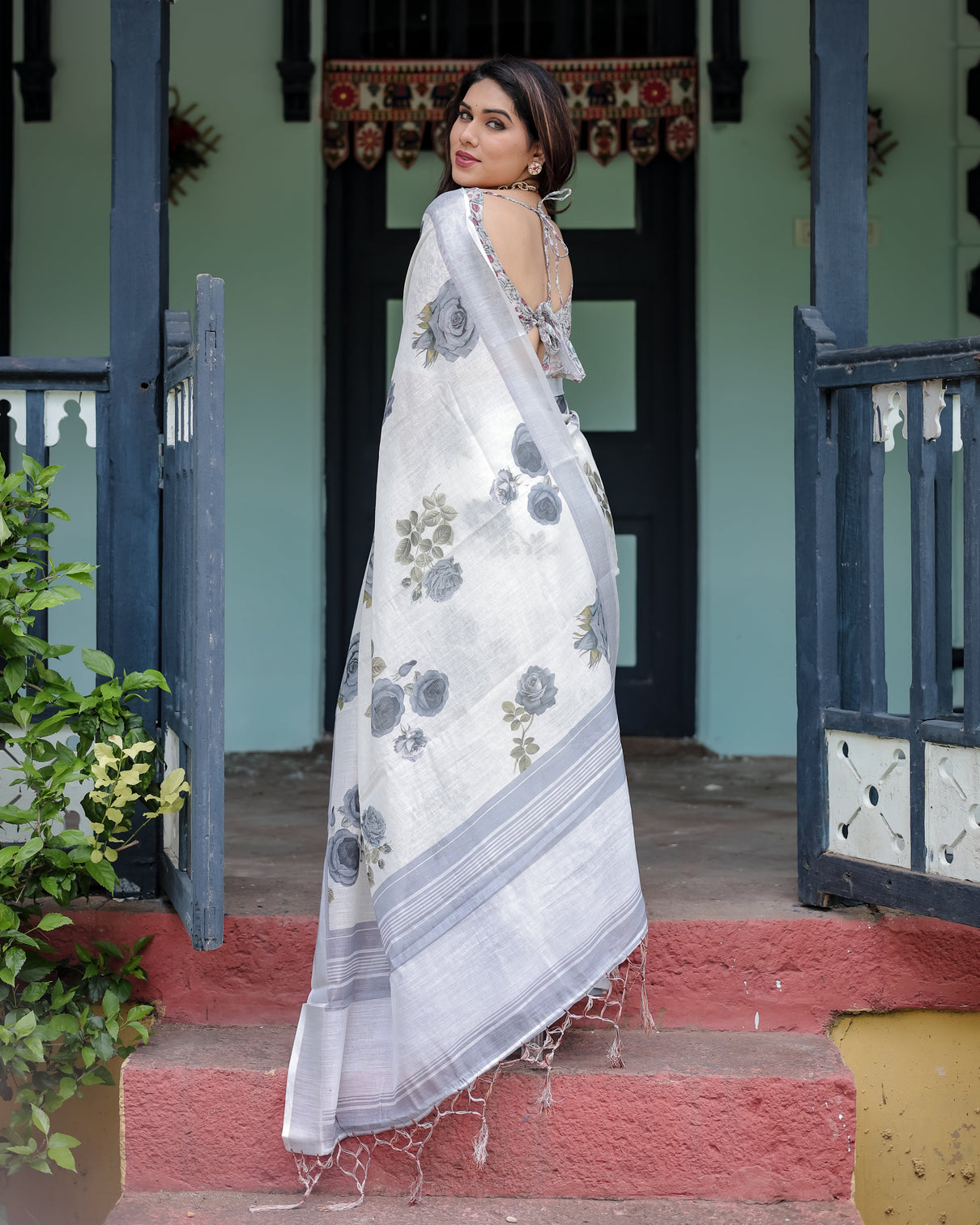 White and grey pure cotton linen saree with floral print blouse and tassel detailing