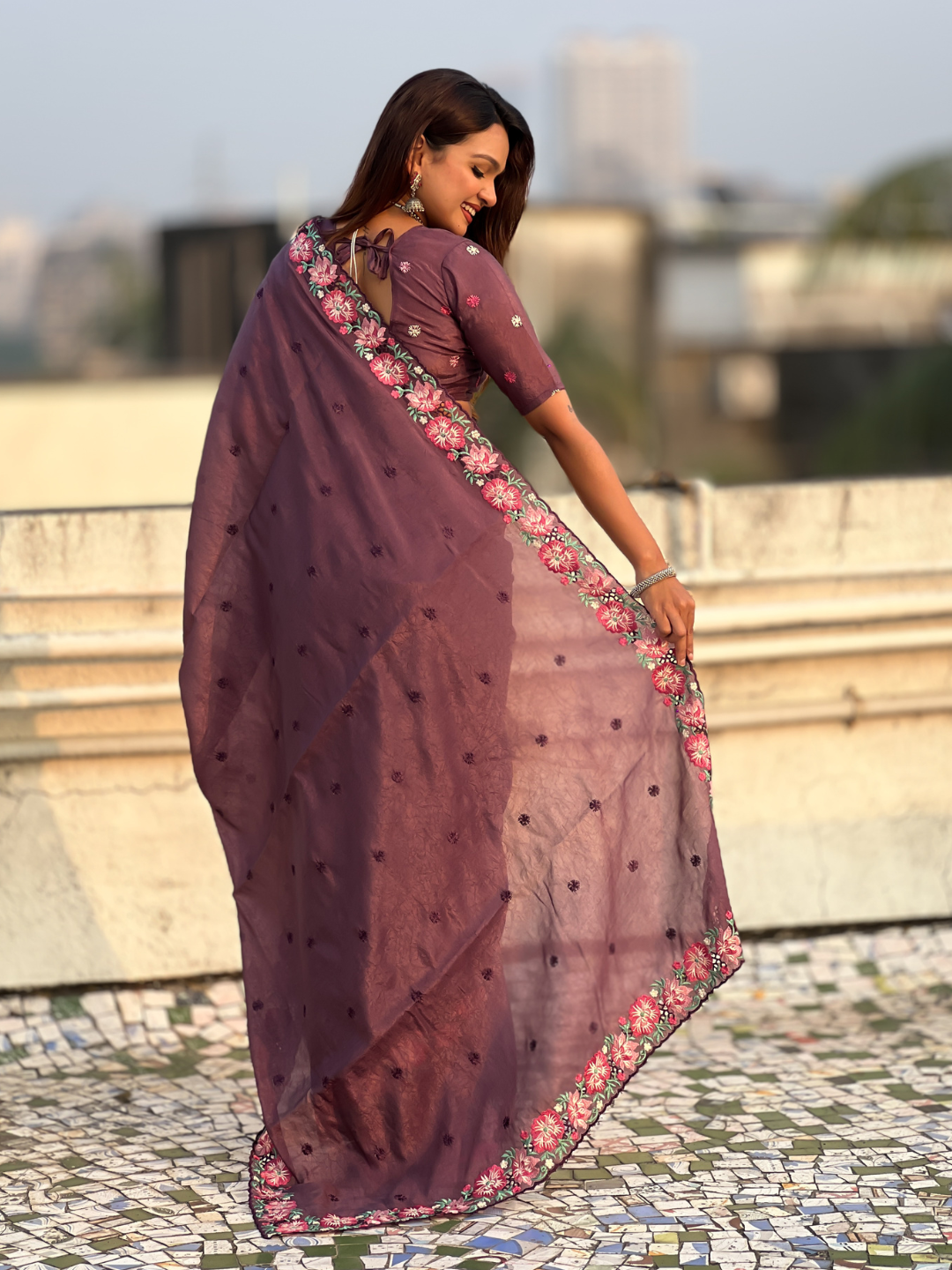 Wine pure crush embroidered saree with multicolor floral motifs and cutwork border
