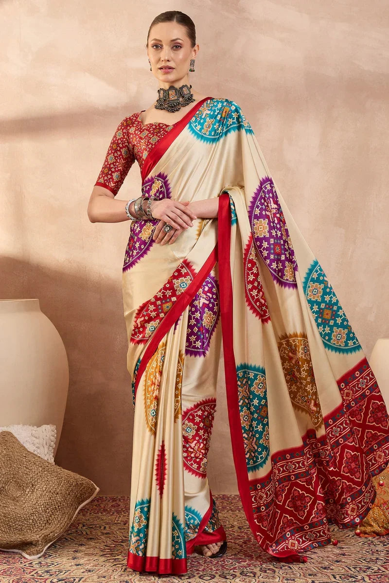Cream modal silk saree with multicolor patola inspired print ruby red border designer festive wear saree mameraa