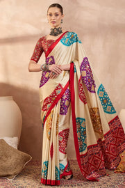 Cream modal silk saree with multicolor patola inspired print ruby red border designer festive wear saree mameraa