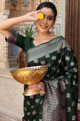 Designer Green Saree Showcasing Peacock & Floral Zari Weaving With Handmade Tassel Pallu