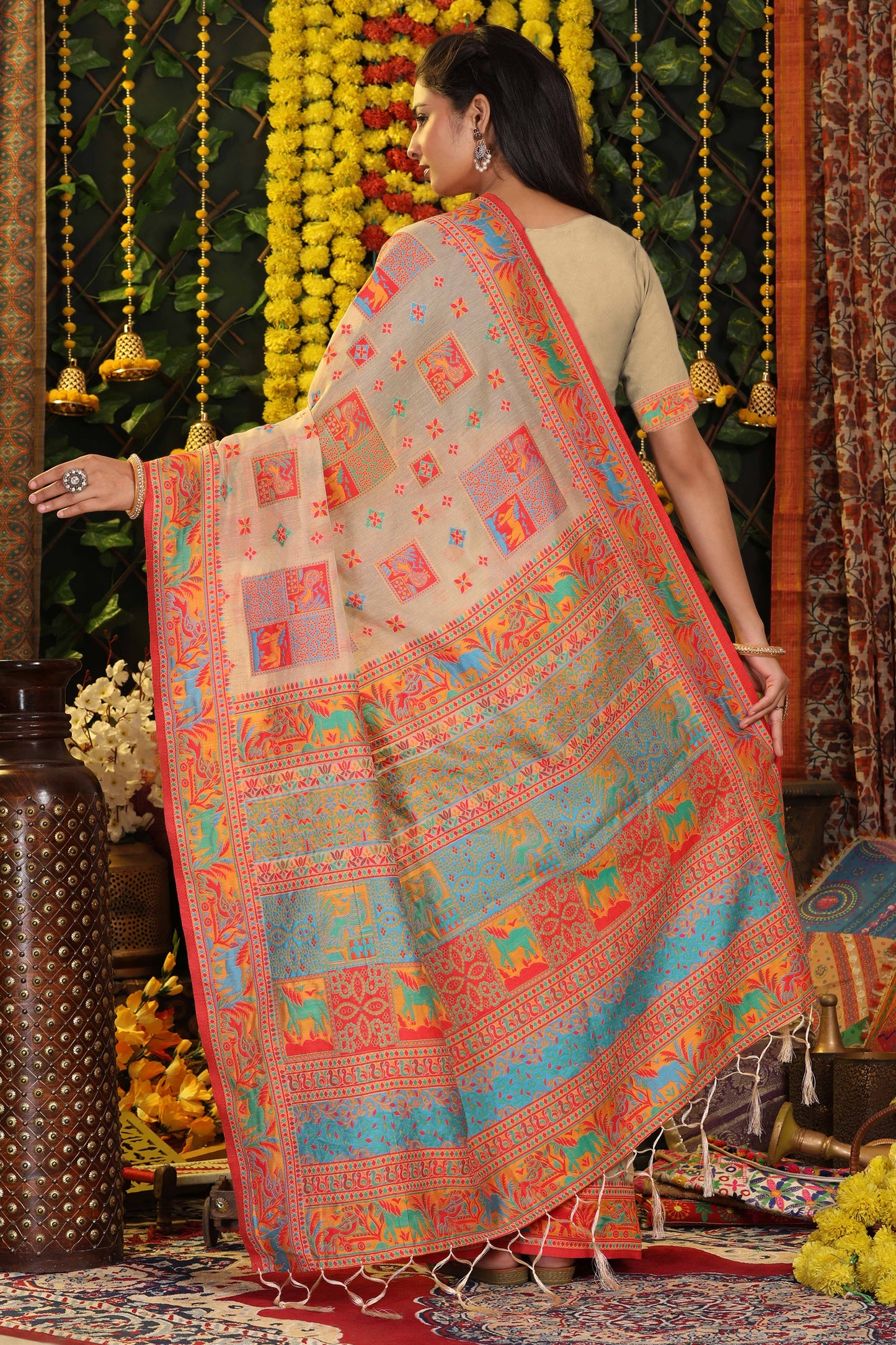 Offwhite Linen Cotton Saree Adorned With Floral Zari Weaving & Tassel Pallu