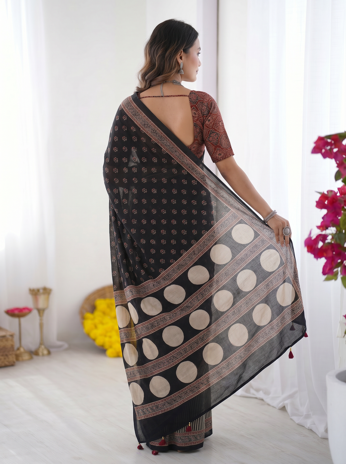 Black modal silk saree with floral butti prints striped pleats statement geometric designer pallu