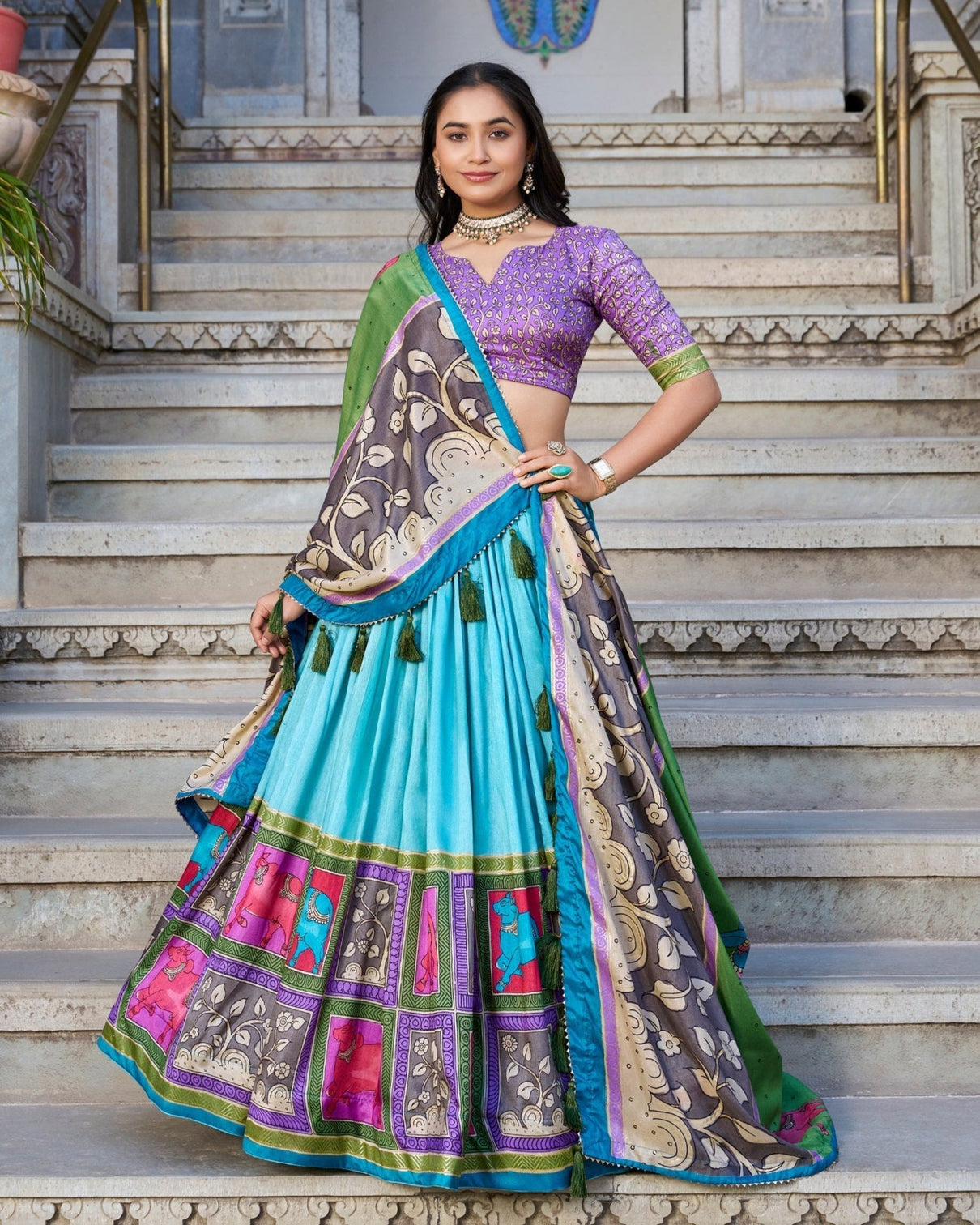 Turquoise blue purple tussar silk kalamkari lehenga choli with elegant foil work mameraa