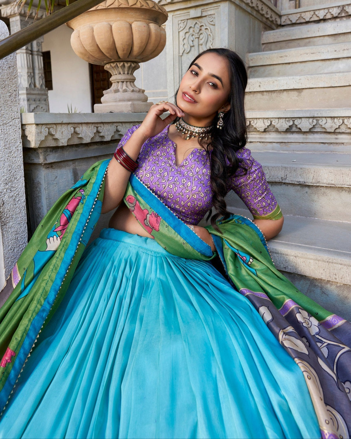 Turquoise blue purple tussar silk kalamkari lehenga choli with elegant foil work