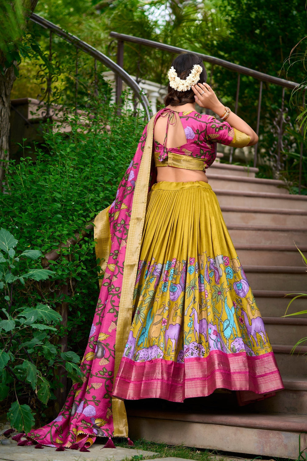 Regal fuchsia golden mustard kalamkari dola silk lehenga set a masterpiece of heritage elegance