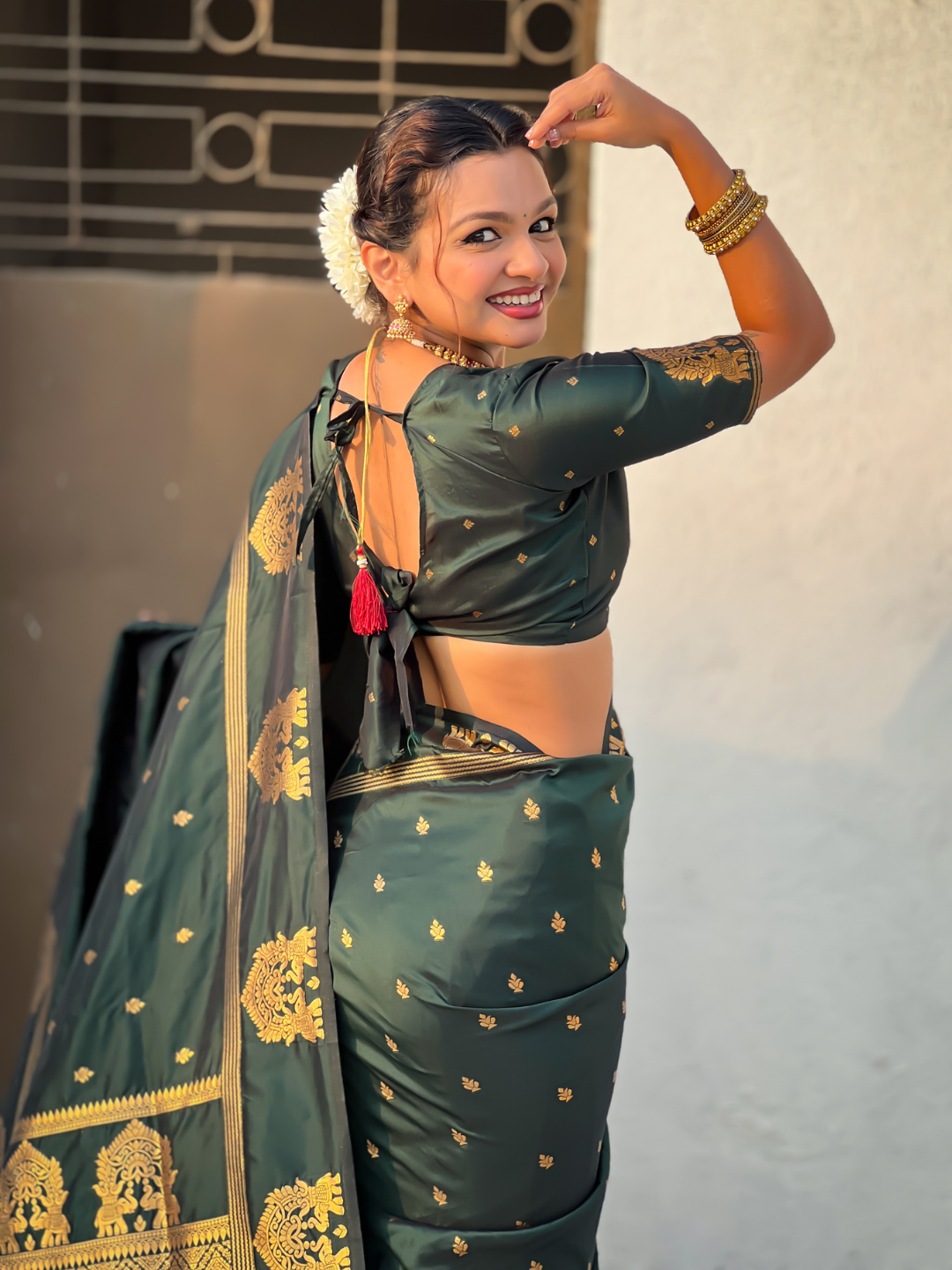 Bottle Green Soft Silk Traditional Zari Woven Saree