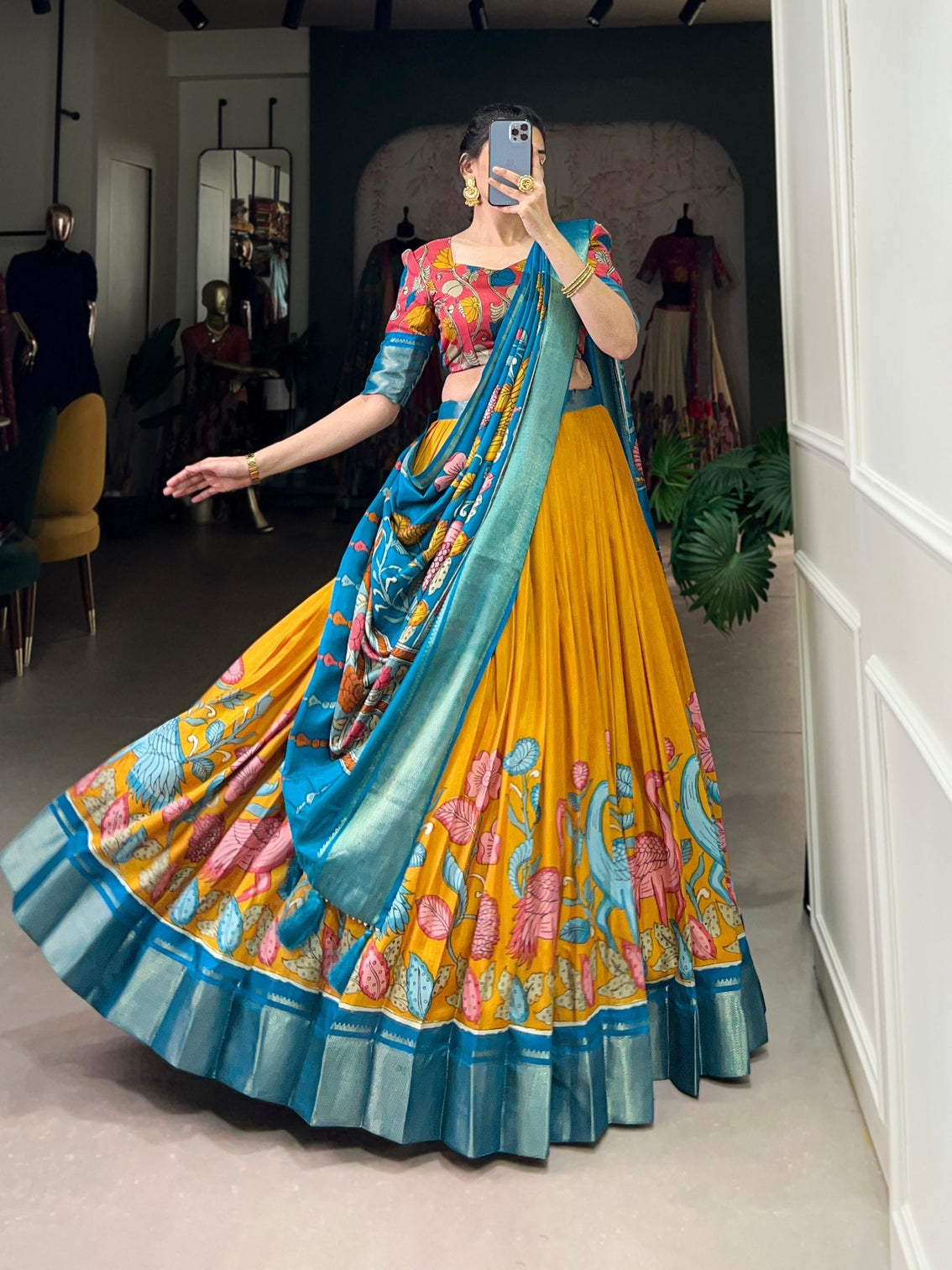 Saffron gold ocean blue kalamkari dola silk lehenga set a regal symphony of tradition luxury mameraa