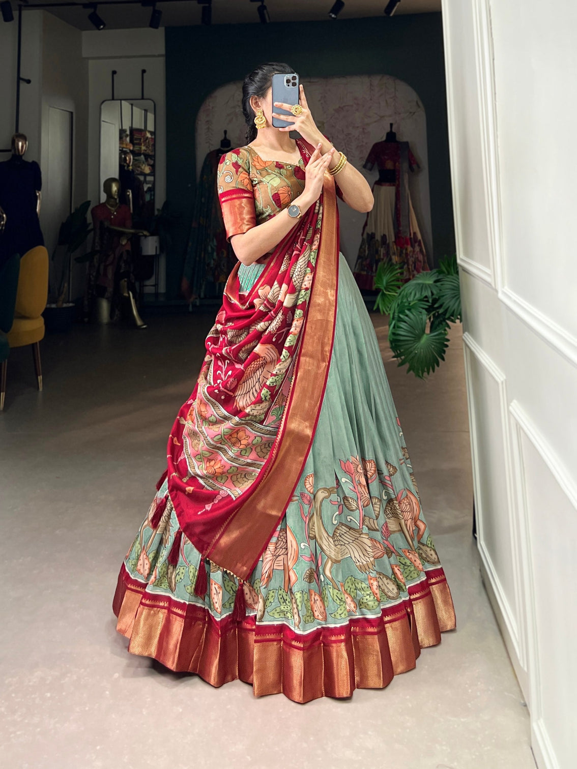 Scarlet red sage green kalamkari dola silk lehenga set a harmonious blend of heritage elegance