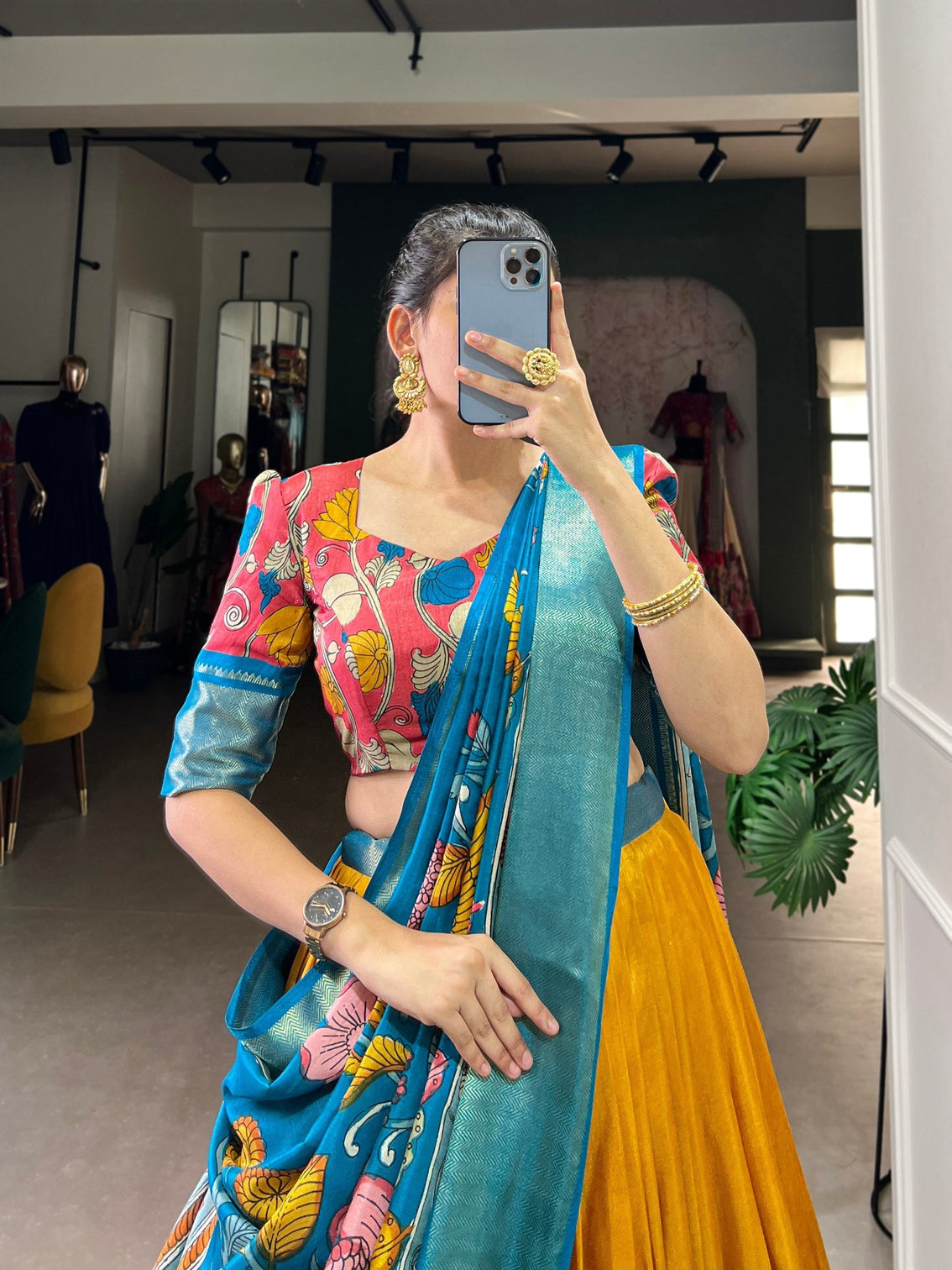 Saffron gold ocean blue kalamkari dola silk lehenga set a regal symphony of tradition luxury