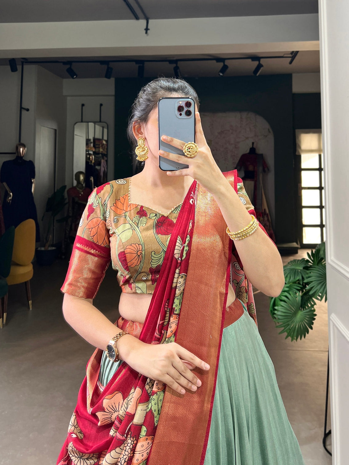 Scarlet red sage green kalamkari dola silk lehenga set a harmonious blend of heritage elegance