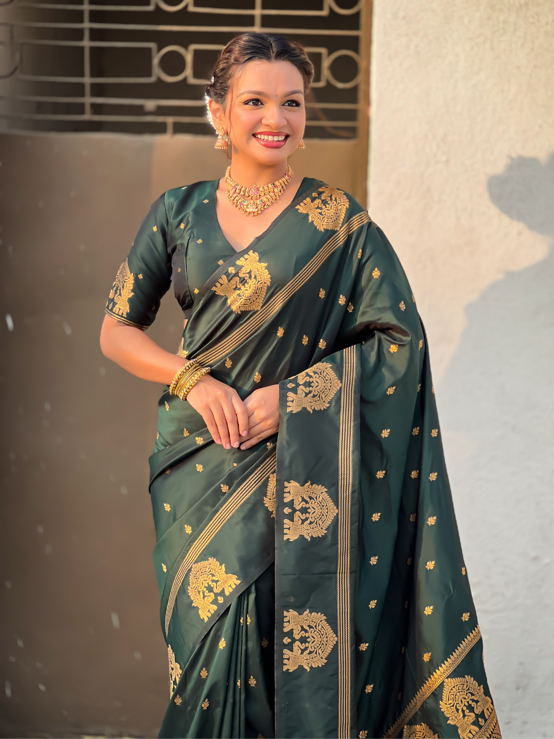 Bottle Green Soft Silk Traditional Zari Woven Saree