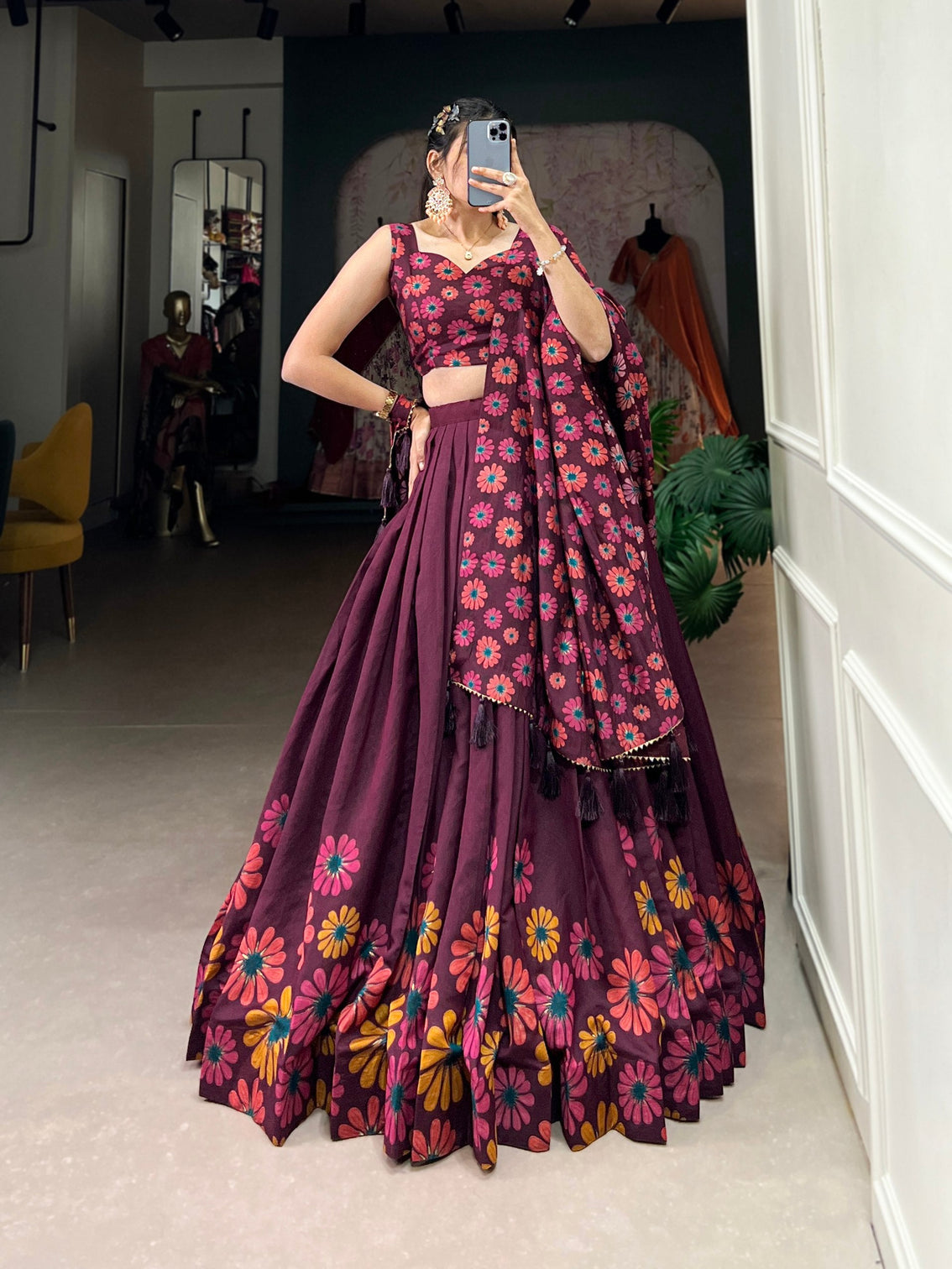 Elegant plum tussar silk floral printed lehenga set with foil detailing tassel dupatta