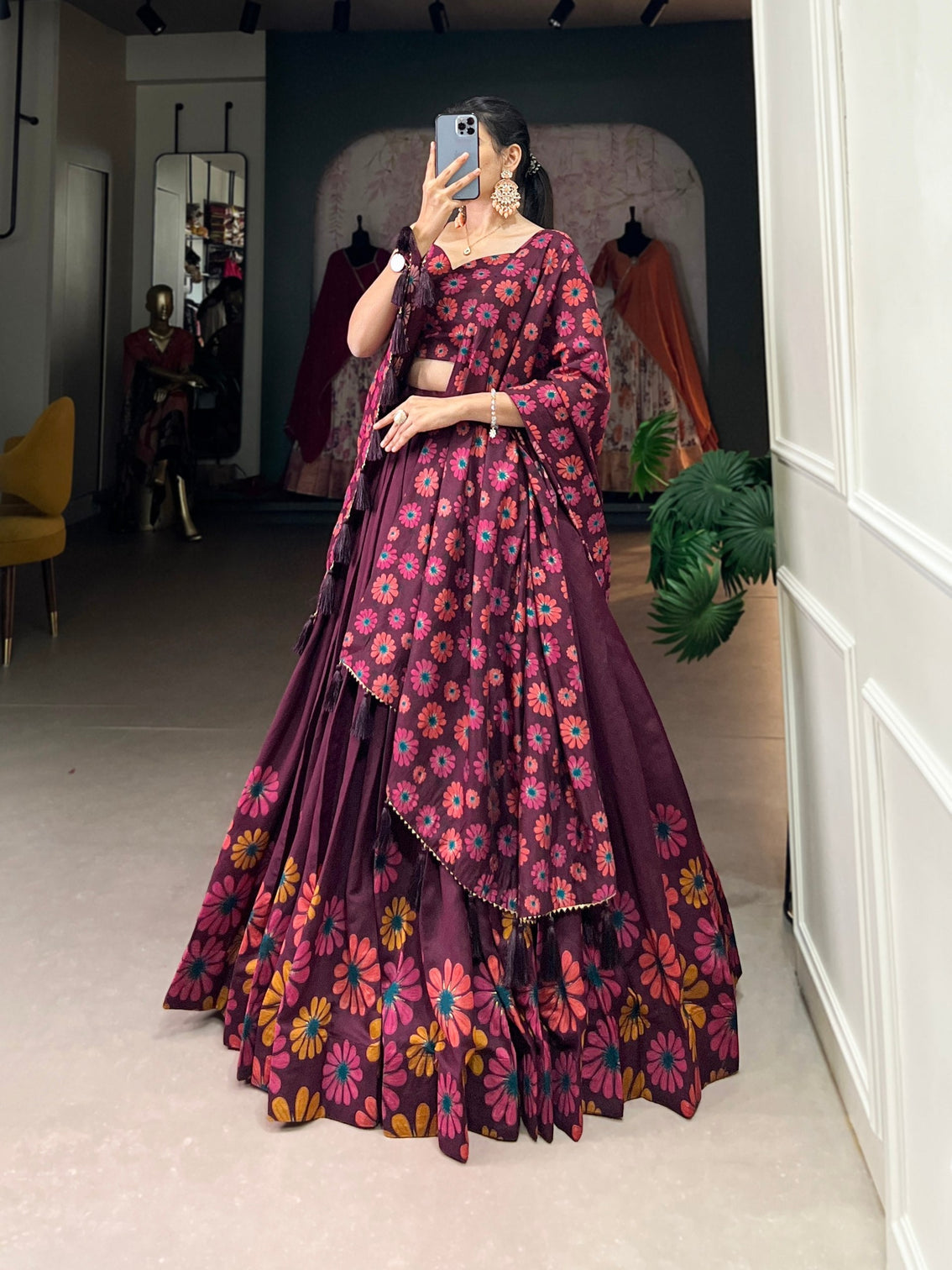 Elegant plum tussar silk floral printed lehenga set with foil detailing tassel dupatta
