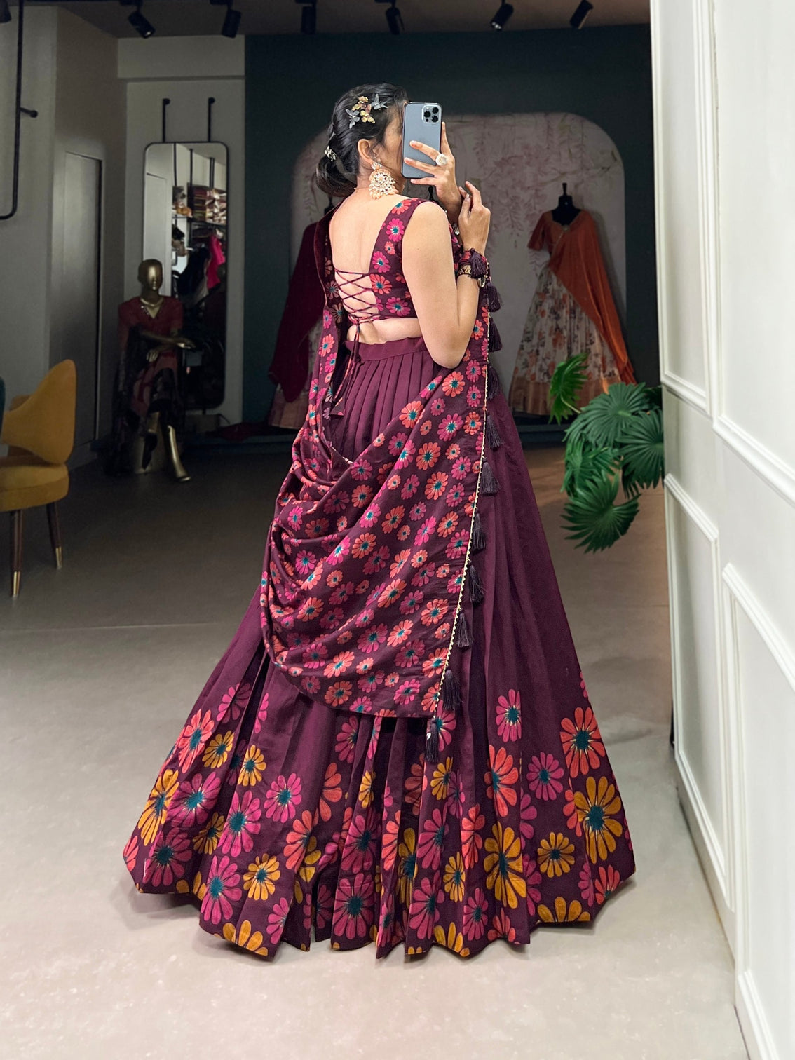 Elegant plum tussar silk floral printed lehenga set with foil detailing tassel dupatta