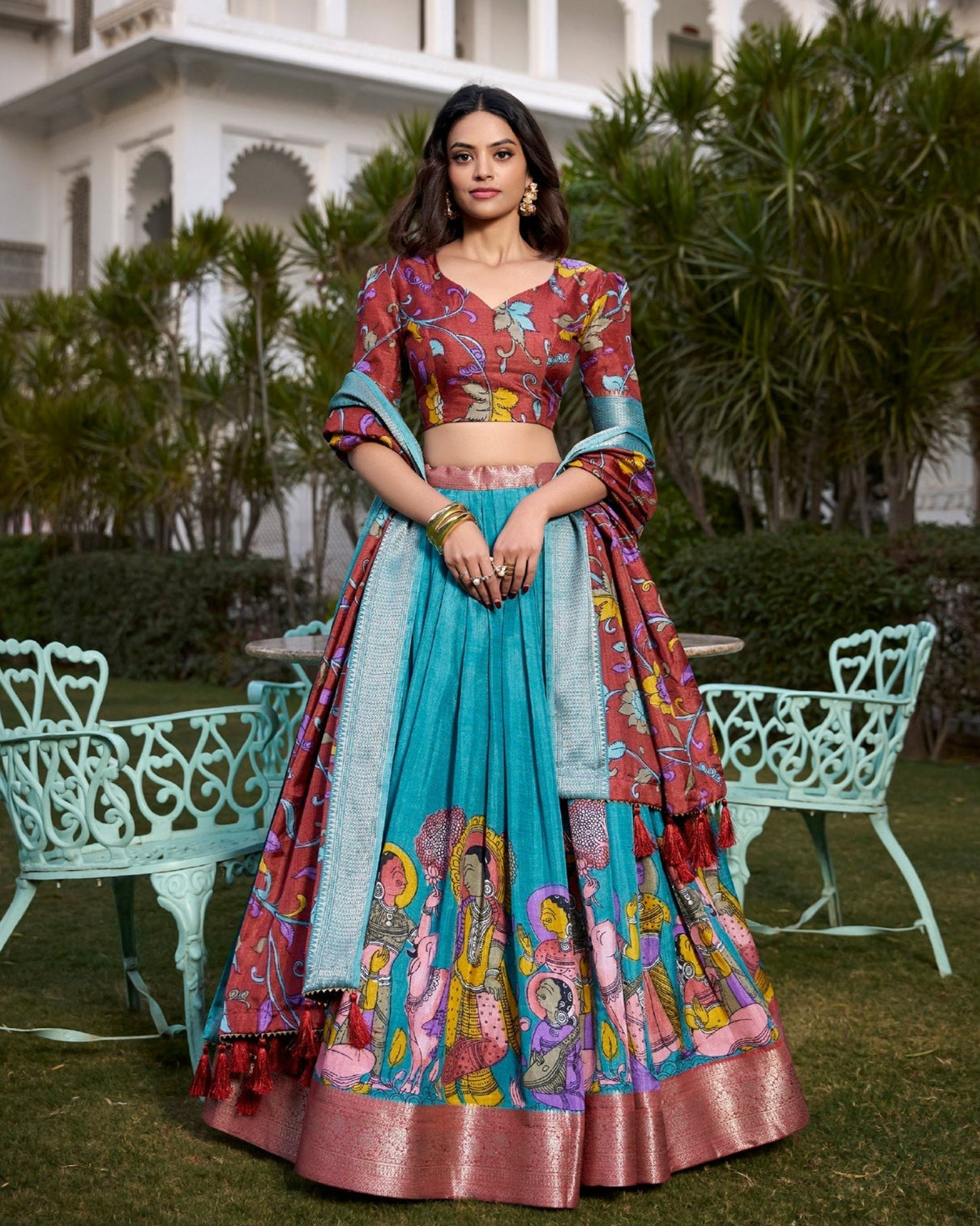 Exquisite aqua blue rust dola silk kalamkari lehenga set with zari weaving border