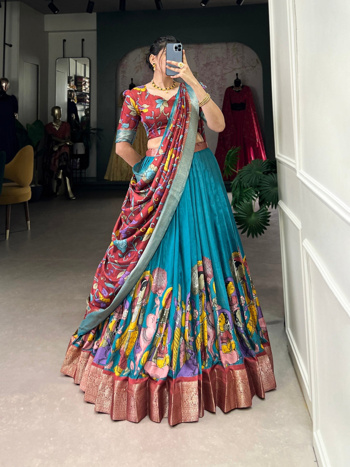 Exquisite aqua blue rust dola silk kalamkari lehenga set with zari weaving border