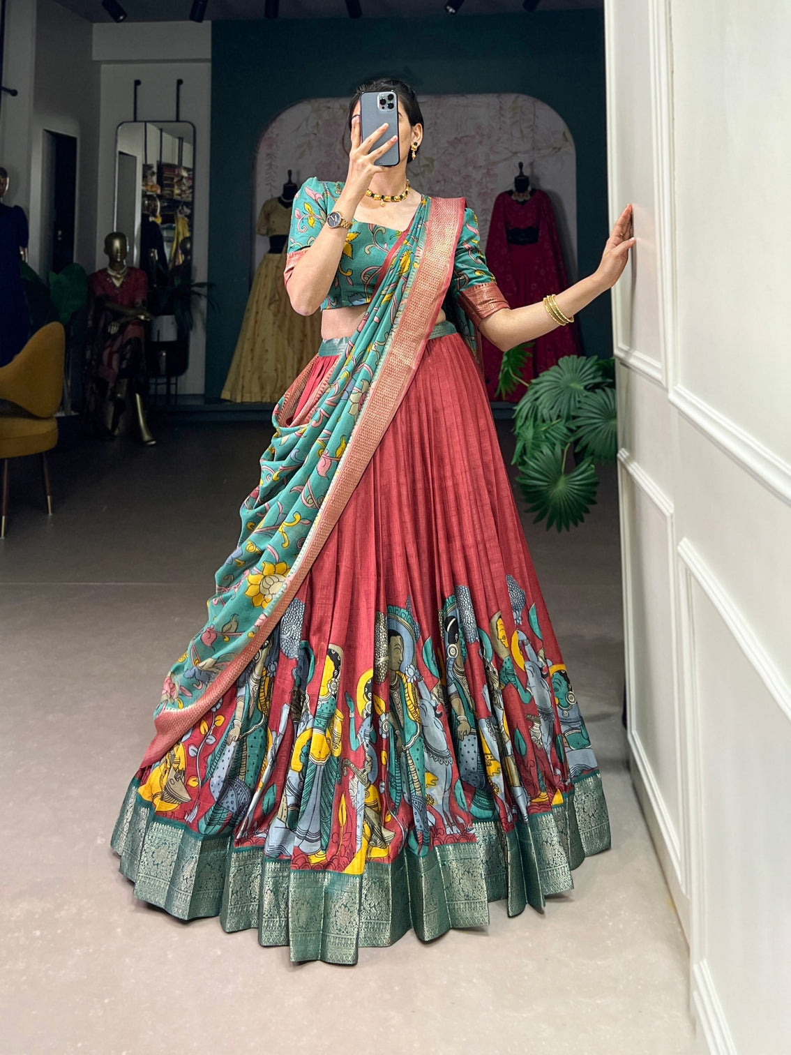 Elegant green rust kalamkari print dola silk lehenga set mameraa