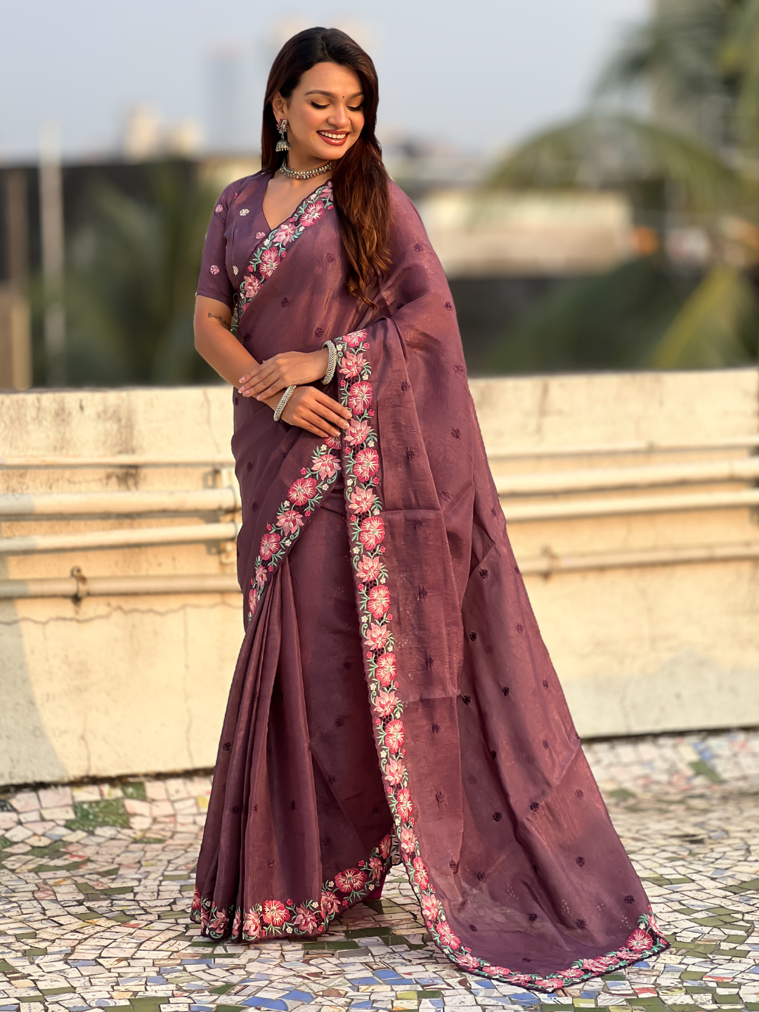 Wine pure crush embroidered saree with multicolor floral motifs and cutwork border