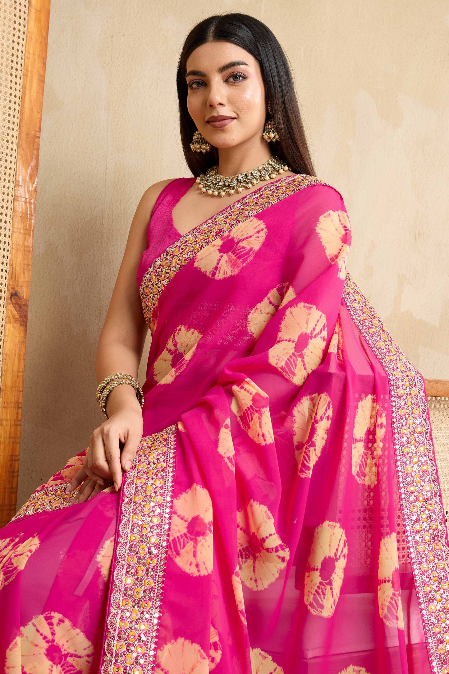 Pink Georgette Saree with Contemporary Tie-Dye Patterns and Classic Lace Work Finish