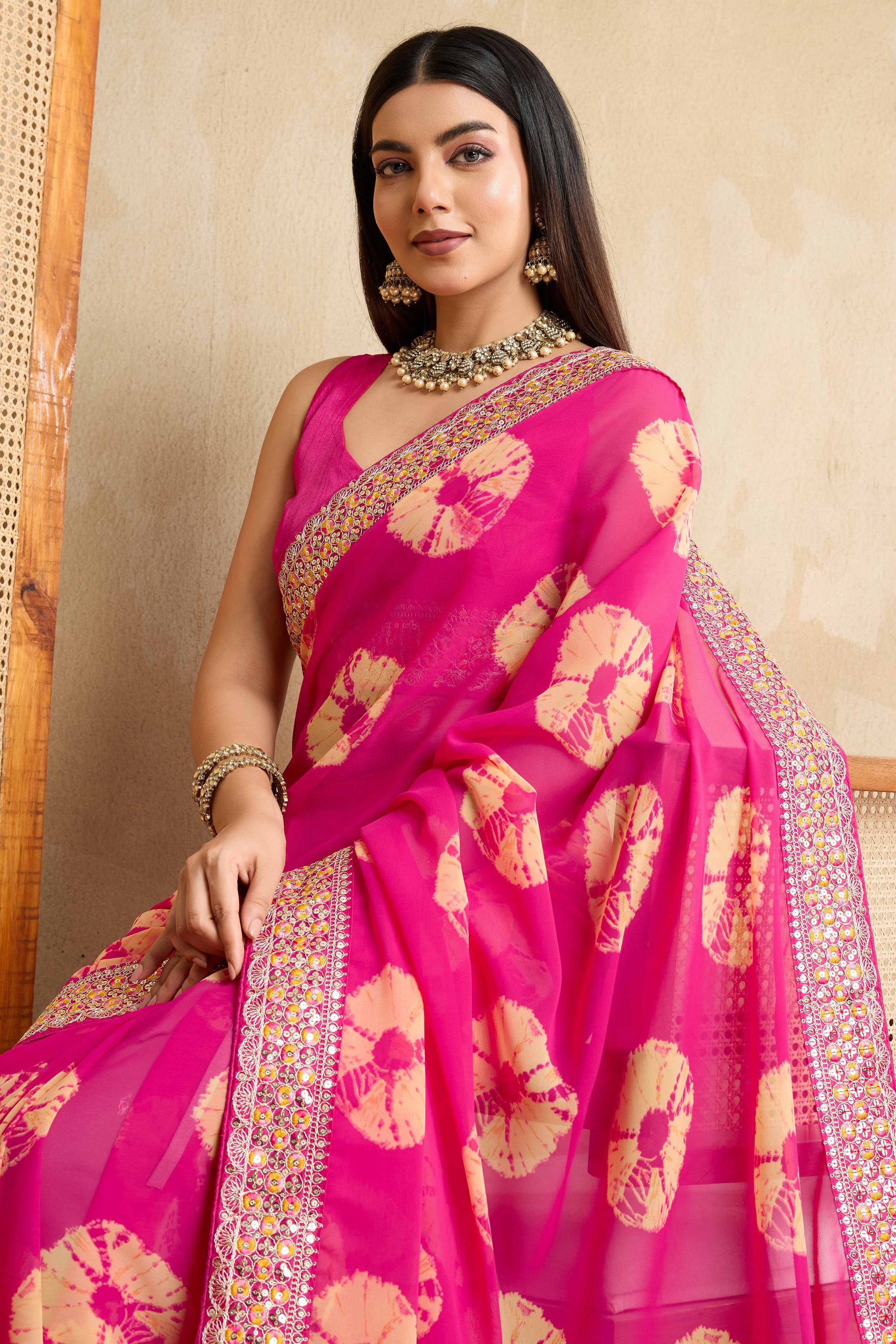 Pink Georgette Saree with Contemporary Tie-Dye Patterns and Classic Lace Work Finish